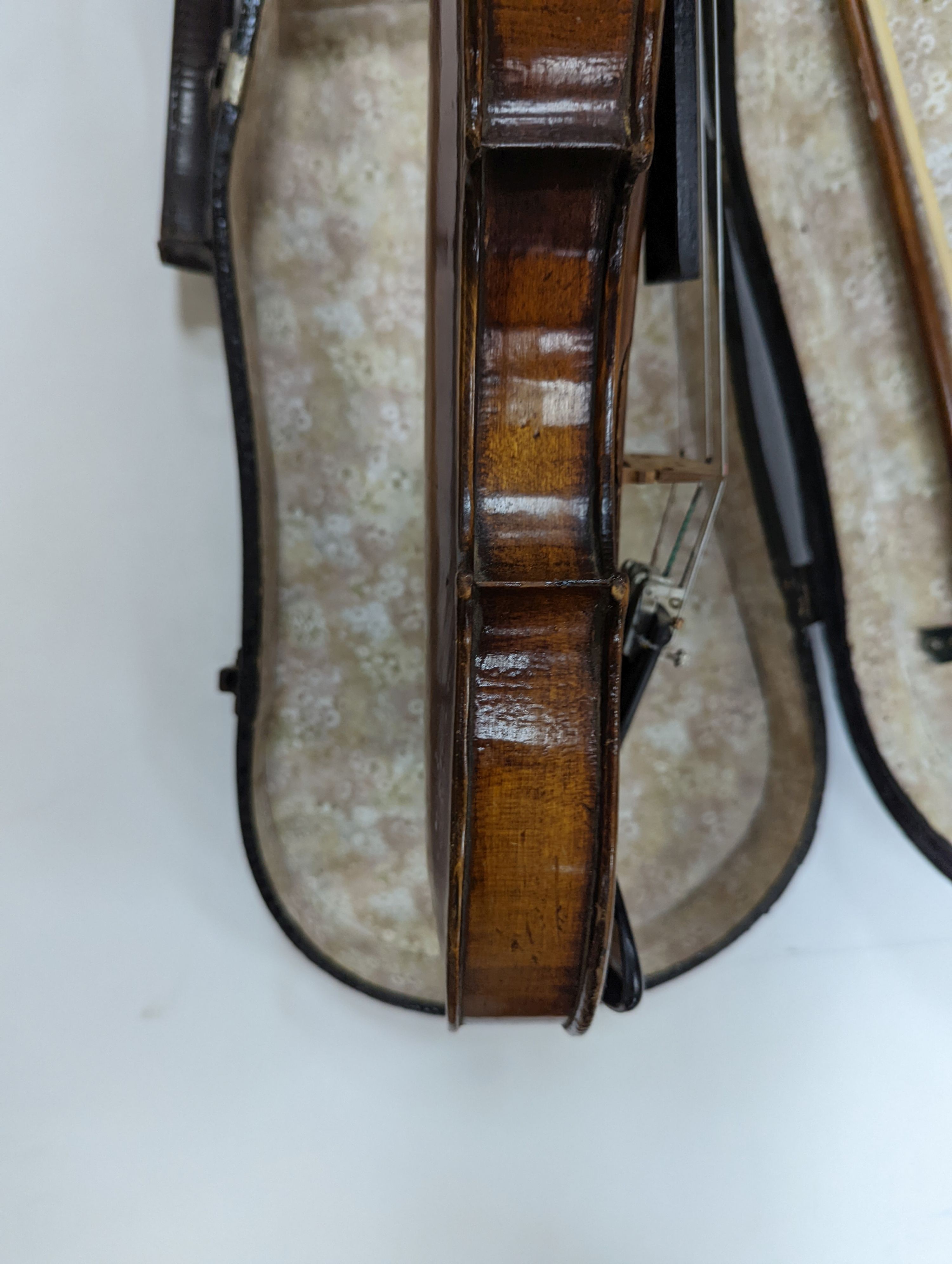 Two cased violins and bows, one with ‘Antonius Straduarius Cremonensis Faciebat Anno 17/13 Made In Czechoslovakia’ label to interior